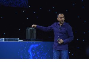 Navin Shenoy, Intel executive vice president in the Data Center Group, motions to a 5G base station prototype during Intel Corporation’s news event at CES 2019 on Jan. 7, 2019, in Las Vegas. Intel displays how its technology is the foundation for the world’s most important innovations and advances at CES 2019 from Jan. 8-11 in Las Vegas. (Credit: Walden Kirsch/Intel Corporation)